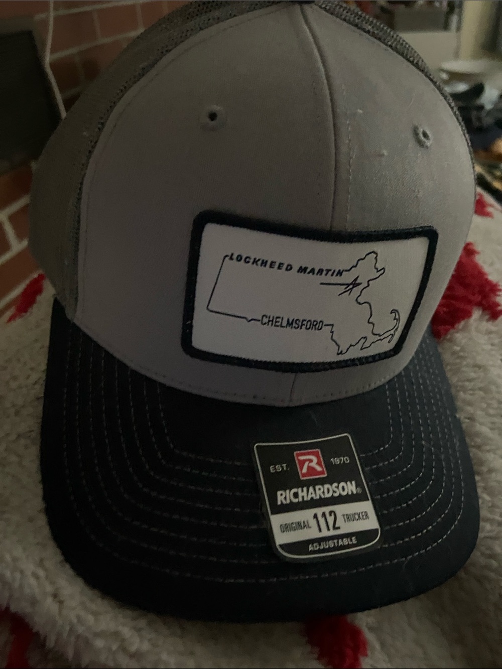Richardson Gray and Black Trucker Hat with Lockheed Martin Chelmsford Patch